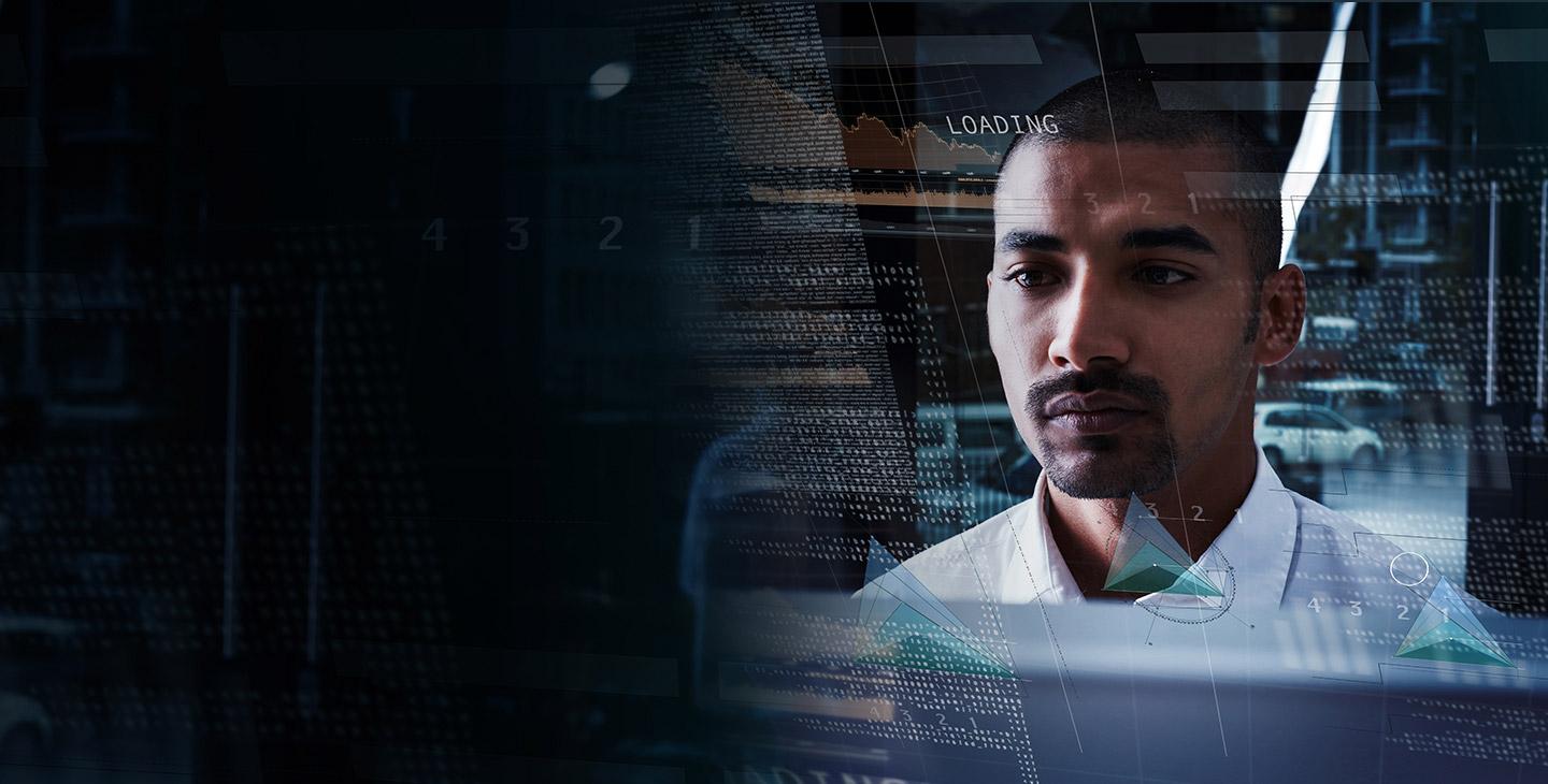 Man looking at projected managed network security data on a glass screen